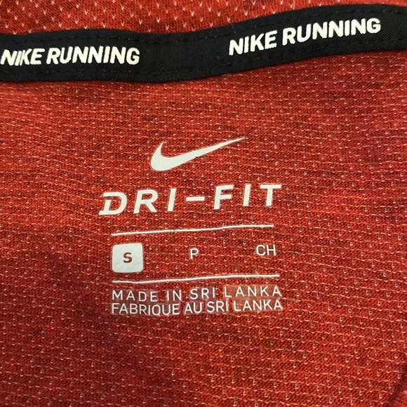 Burgundy red Nike tank. No issues. Reflective Nike symbol. - Picture 3 of 4